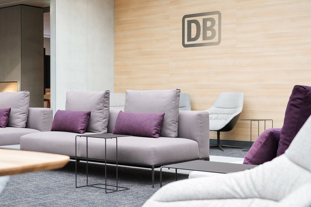Sofa in DB Lounge with seat cover made of marine plastic fibers.