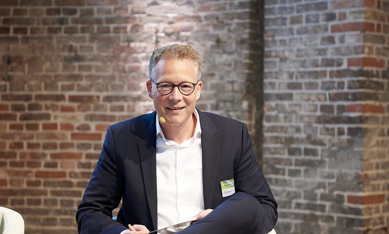 The Head of Sustainability and Environment of Deutsche Bahn, Andreas Gehlhaar, at the 2019 Umweltforum.