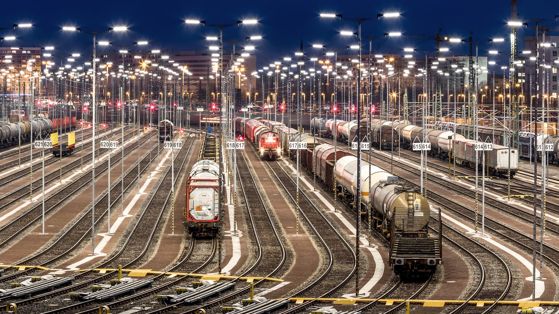 A track system is illuminated at night using LED technology.