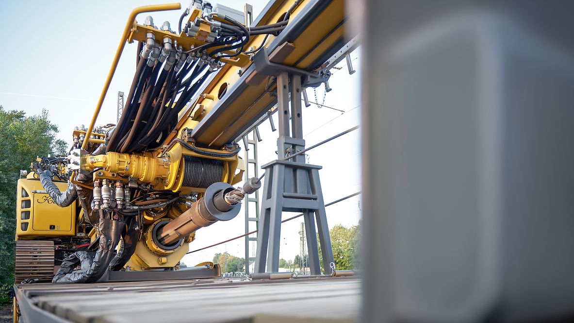 A crawler drill being used to erect an overhead line mast. 