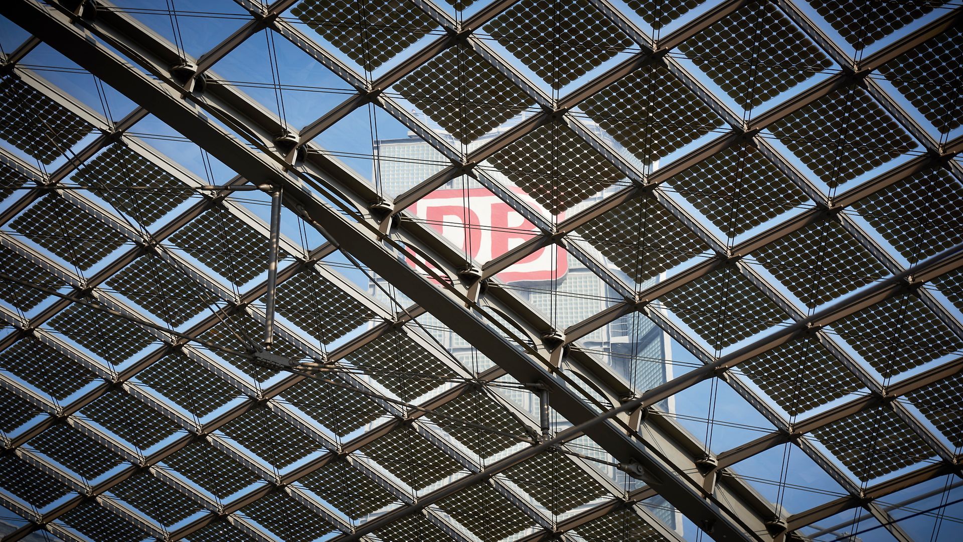 The DB tower in Berlin seen through solar panels