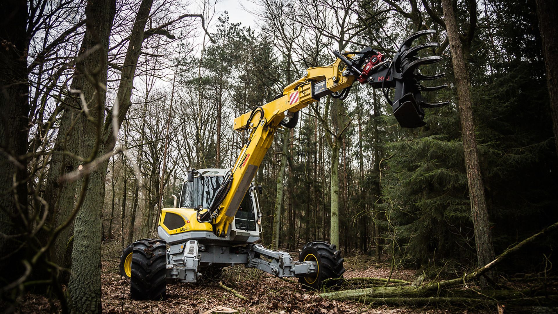 12-ton walking excavator in the woods