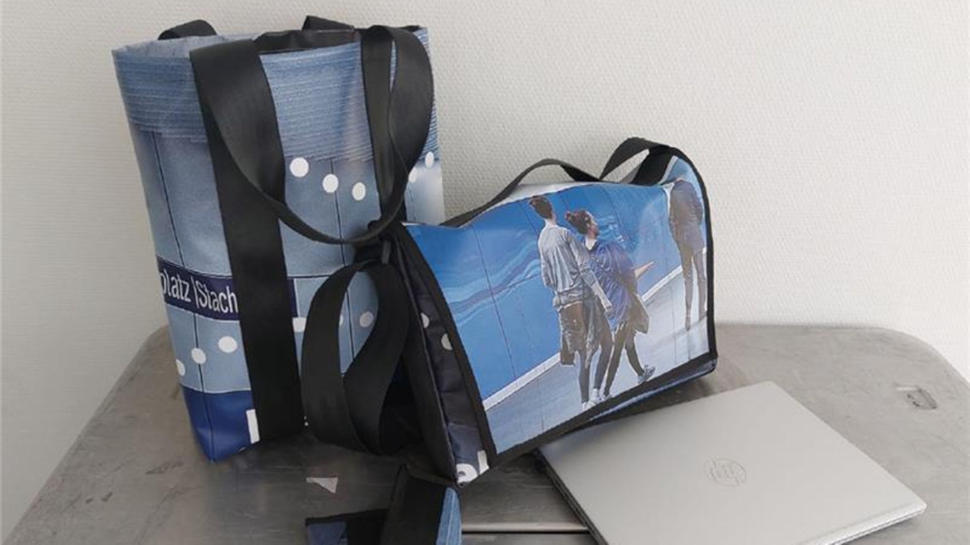 Bags made from upcycled construction site banners