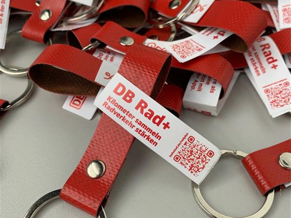 Keychains made from upcycled red freight car tarpaulin