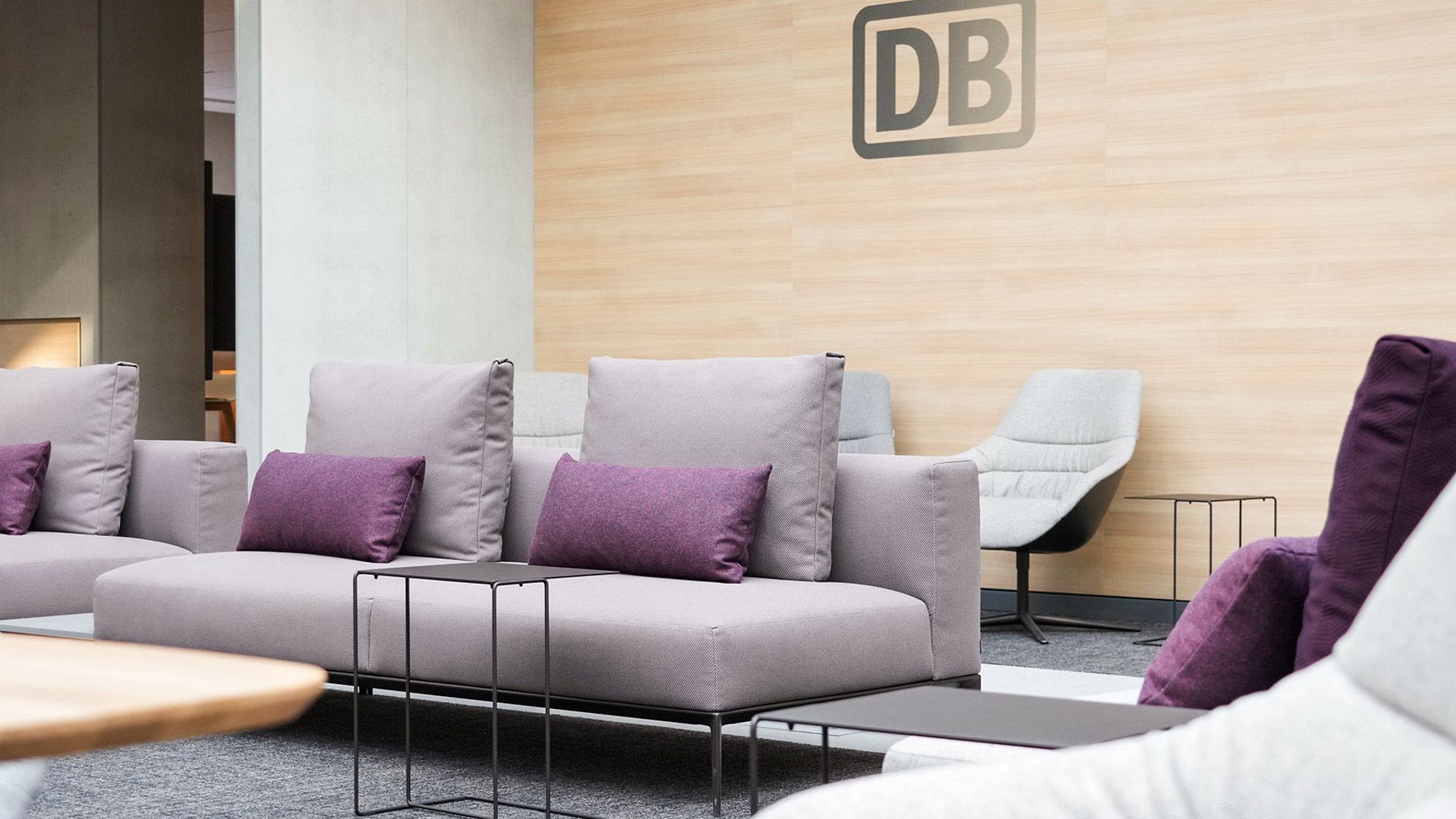Sofa in the DB Lounge with seat covers made from marine plastic fibers
