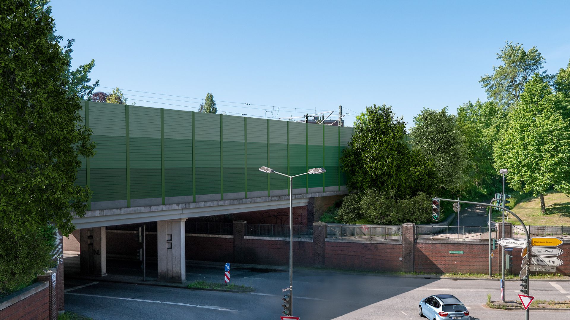Conventional non-transparent noise barrier on a bridge with road crossing below